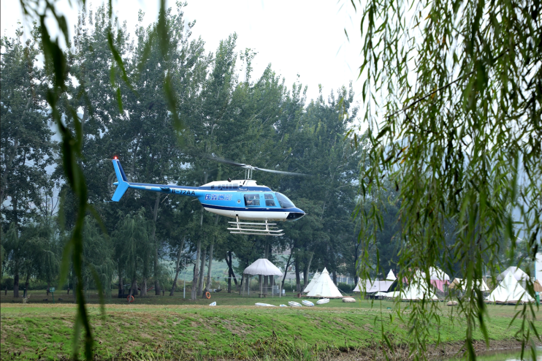 低空飛行體驗活動在美麗的太行水鎮(zhèn)露營基地舉行。付小杰 攝